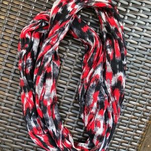 Red, black, gray, and white infinity scarf